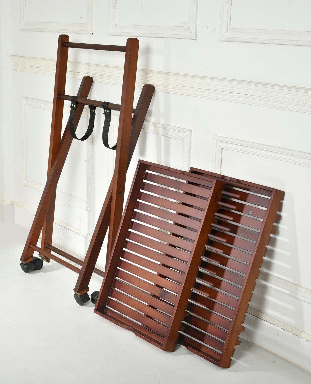 Bar trolley folded flat against a wall